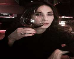 Carice van Houten consuming alcohol